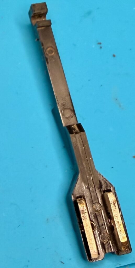 RB1 switch sled, with contacts in-place, ready to be hooked into the switch frame over the large spring and ball bearing.