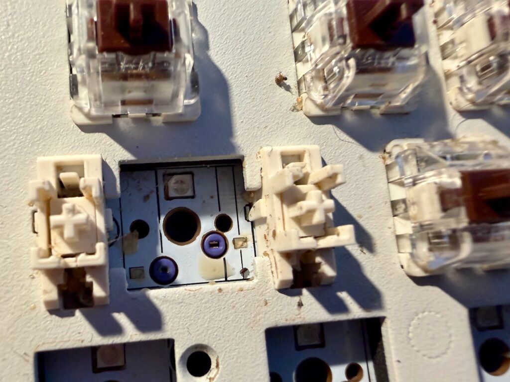 Tea splashes that found their way behind the key switches.